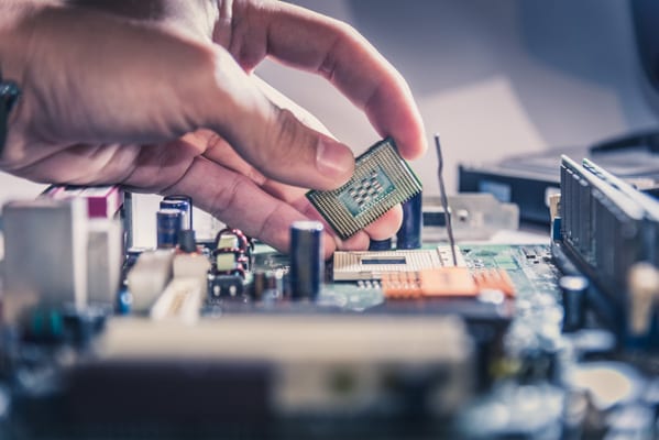 How does Microprocessor command external devices?